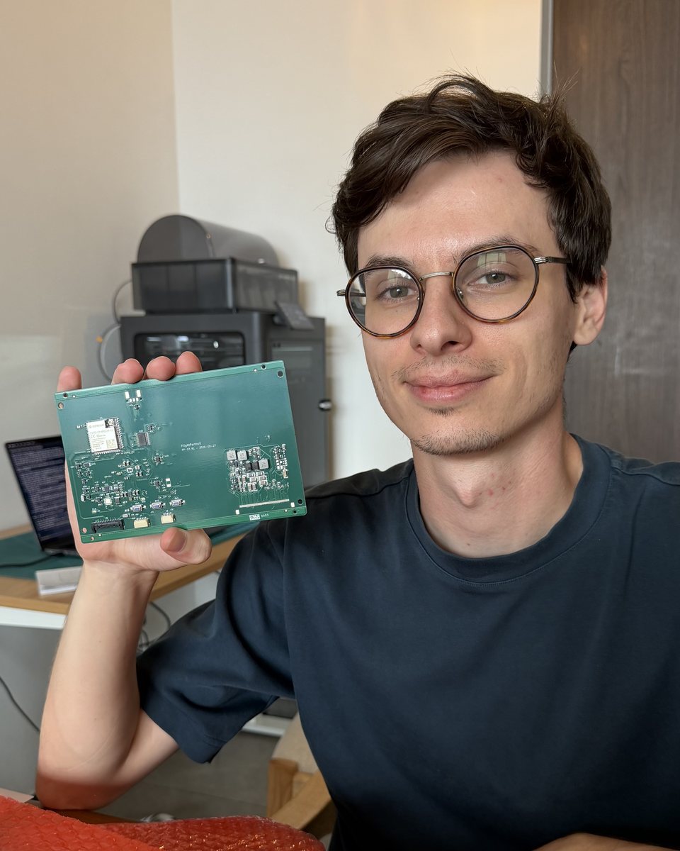 Yoann holding the frame's circuit board.
